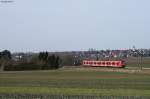 425 3** hat als RE 19588 (Freudenstadt-Stuttgart) nun den Bahnhof Hochdorf (bei Horb) verlassen und fhrt nun unterhalb des Nagolder Stadtteils Hochdorf dem nchsten Halt Eutingen (Gu) entgegen. Dort wird er dann mit dem aus Rottweil kommenden RE 19088 (auch ein 425) vereint. Aufgenommen am 16.03.2013 nahe Eutingen (Gu).