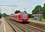 425 070 bei der Abfahrt aus Rheydt Hbf in Richtung Aachen Hbf auf der RB 33. 4.7.2013