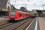 Am 22.05.2013 fuhr 425 119-5 als RB 44 aus Mainz Hbf nach Mannheim Hbf aus dem Bahnhof von Worms aus.