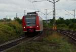 Ohne Neigetechnik legt sich der 425 040 im Gleisbogen,im Bahnhof Leutesdorf Gleis 3 mchtig ins Zeug, auf seinem Weg in Richtung Kln als RE8. 14.9.2013