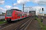 Einfahrt am 24.05.2014 von 425 721-8 zusammen mit 425 727-5 (425 225-0) als S2 nach Kaiserslautern in Ludwigshafen (Rhein) Mitte.