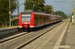 425 557-6 als RE11 nach Mönchengladbach, hier durch Anrath. 13.9.2014