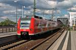 425 250-8 am 24.05.2014 bei der Einfahrt als RB 44 nach Mainz Hbf in Ludwigshafen (Rhein) Mitte.