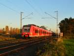 RE8 auf dem Weg nach Mönchengladbach Hbf, wenige Augenblicke zuvor hat er das Stadtgebiet von Köln verlassen und ist nun in Pulheim am Ortseingang einem Industriegebiet.