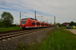 425 605-3 bringt einen umgeleiteten RE11 nach Mönchengladbach Hbf, hier ist der Zug in Kleinenbroich und recht nah an seinem Ziel. 9.5.2016