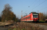 425 096 und 425 054 in Höhe des Anschlussgleises zum Amprion-Umspannwerk in Pulheim.
Aufnahmedatum: 12.11.2011
