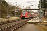 S1 nach Homburg Saar/alias 425 234-2 verlässt Neckargerach am Nachmittag des Rosenmontag 16.2.2015
