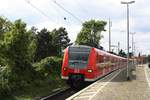 # Roisdorf 49  Die 425 104 von DB Regio NRW aus Köln-Nippes kommend durch Roisdorf bei Bornheim in Richtung Bonn/Koblenz.