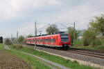 DB 425 310-0 fährt am 01.05.2022 als RB nach Ulm Hbf über die Südbahn bei Bad Schussenried.