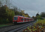 Auf Bauhof höhe kommt der 425 754 als S1 nach Homburg Saar Hbf in Neckargerach eingefahren am Morgen des 21.11.2022 