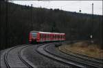426 023/523 und 426 521/021 sind in die Gegenrichtung als RE16 (RE 29674)  Ruhr-Sieg-Express  nach Essen Hbf unterwegs. (01.12.2007)