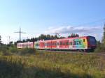 426 038 (Klimaschutz in Saarland) und 426 015 sind als RE 60 Kaiserslautern - Trier am 27.09.2011 in Landstuhl
