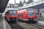 SCHAFFHAUSEN (Kanton Schaffhausen), 01.10.2014, links 611 049 als IRE von Basel Bad Bf zur Weiterfahrt nach Singen (Hohentwiel) und rechts 426 503-9 als Regionalbahn nach Erzingen 