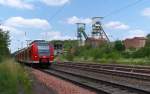 426 043 und ein Schwestertriebwagen verlassen nach einem Planhalt den Bahnhof Luisenthal in Richtung Saarbrücken. RB Dillingen - St. Ingbert am 12.07.2013 - Bahnstrecke 3230 Saarbrücken - Karthaus