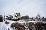 ET 7.11 der Eurobahn passiert im Schnee auf dem immer noch unregelmäßig verkehrenden RE 3 Kamen-Westick (10.02.2021) 
