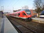 Fotoglck !! 427 001/827 001/301/601/427 501 mit dem RE 33217 Rostock-Sassnitz am 09.04.2008 in Bergen/Rgen