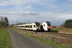 ET 7.07 der Eurobahn als RE 3 nach Hamm und 462 081 der National Express als RE 1 nach Aachen treffen sich in Nordbögge (03.04.2022)