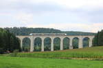 Am 21.08.2014 befährt ein vierteiliger FLirt 2 der Eurobahn als RE 89 Hamm-Warburg den kleinen Viadukt bei Altenbeken. 