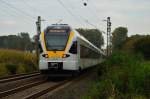 Nachschuß auf einen RE13 nach Düsseldorf Hbf, der hier zwischen Korschenbroich und Kleinenbroich von mir am 11.10.2014 abgelichtet wurde.
