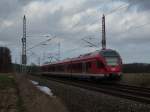 Zwischen Bergen/Rgen und Lietzow fotografierte ich,am 21.Mrz 2010,den RE 33313 Stralsund-Binz.