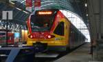 429 541-6 und zwei weitere Flirts als HLB24958 (Frankfurt(Main)Hbf-Marburg(Lahn)) im Startbahnhof 4.1.10