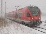 Durch den heftigen Schneefall bis nach Bergen/Rgen gekmpft hatte sich 429 029 mit dem RE Rostock-Sassnitz am 09.Dezember 2010 und das sogar pnktlich !