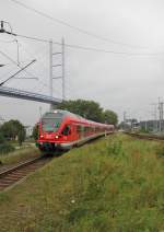 Ein Flirt der DB erreicht den Bahnhof Stralsund - Rgendamm von der Insel Rgen kommend. Aufgenommen am 11.08.2011.