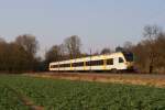 Eurobahn Flirt als RE 3 nach Dsseldorf Hbf als Umleitung ber die Gterbahn. Hier in Ratingen am 23.03.2012