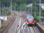 Am 20.Juni 2012 verlie RE 13031 Stralsund-Binz den Bahnhof Bergen/Rgen.Aufnahme von der Fussgngerbrcke.