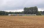 Aus Venlo kommend ist dieser mir unbekannte ET der Eurobahn auf dem Weg nach Hamm.....hier ist der Triebzug der Linie RE 13 zwischen Dlken und Viersen am Stadtgarten zu sehen.