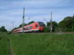 Als RE 13014 Binz-Rostock kam 429 030 mir,am 27.Mai 2013,bei Bergen/Rgen entgegen.