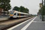 Der Eurobahntriebwagen ET 7.02 fährt hier als RE13 durch Korschenbroich auf seinem Weg nach Venlo/Nl. 29.7.2014