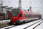 429 028-4  Hansestadt Stralsund als RE 13008 von Sassnitz nach Rostock Hbf bei der Einfahrt im Rostocker Hbf neben an auf Gleis 3 stand immer noch IC 2213(Binz-Stuttgart)Grund mal wieder Probleme mit der 2.Lok.06.02.2015