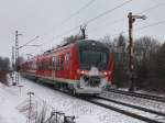 Der 440 203 am 04.01.2011 als RE nach Passau unterwegs bei Pleinting.