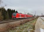 Der 440 701 als RE nach Mnchen am 12.01.2013 unterwegs bei Langenisarhofen.
