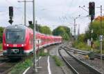 440 040 fährt am 29.9.10 als RE nach Würzburg auf Gleis 2 in Neustadt an der Aisch ein.