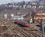 4-teilige Bombardier Talent II  442 267 und 442 218 abgestell am 24.03.2012 in Siegen vor den Stellwerk Siegen Fahrdienstleiter (Sf).