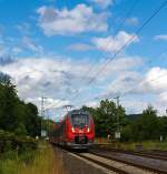 442 263 und 442 257 zwei gekuppelte Talent 2  als RE 9 (rsx - Rhein-Sieg-Express) Siegen - Kln - Aachen fahren hier am 08.07.2012 bei Siegen-Eiserfeld in Richtung Kln.