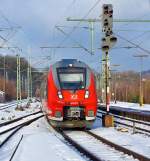 Ein Bombardier Talent 2 - 442 259 (vierteilig) und gekuppelt mit 442 301 (fnfteilig) als rsx – Rhein-Sieg-Express (RE 9) am 28.01.2013 bei der Einfahrt in den Bahnhof Betzdorf/Sieg.