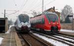 442 209 war am 31.01.14 als RE von Cottbus nach Leipzig unterwegs, als er in Leipzig-Thekla seinen silbernen Bruder 1442 119 traf.