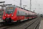 Bei einsetzendem Regen hatte 442 843-9 als RB 12(RB 13260)von Ribnitz-Damgarten West nach Rostock Hbf im Rostocker Hbf.05.02.2016