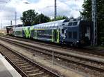 Lok 346 988 /V60.7der HVLE schiebt die  TWINDEXX  Triebwagen 445 011 und 027 von Bombardier in den Güterbahnhof von Hennigsdorf.