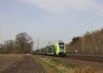 Eine Twindexx Doppeltraktion fährt am 12.04.2022 als RE 7 nach Hamburg Hbf durch Halstenbek 
