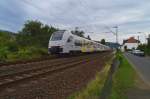 Bei der Ausfahrt aus dem Bahnhof Bad Salzig nahe des Herrengutweg ist hier der von 460 508-5 der Mittelrheinbahn gefhrte Zug nach Mainz zu sehen.