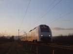 460 109 der MittelRhreinBahn fährt bei letztem Licht dem nächstem Halt Gau-Algesheim an. (Februar 2014)