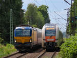 In Kamen Methler begegnen sich 193 935 mit dem IC Leerpark Richtung Hamm und 462 073 als RE1 nach Aachen. Juli 2025