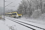 Auch der 8442 625 als RE10a nach Mannheim verdiente bei dem Schneetreiben einen Nachschuß seiner Durchfahrt in Neckargerach.