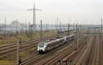 9442 112 verlässt zusammen mit 9442 103 am 02.12.17 den Bahnhof Bitterfeld.