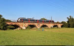 Ein 9442 (Bombardier Talent 2) fährt durch die Saaleaue bei Angersdorf.