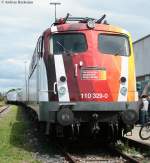 110 329-0 mit Science Express im Freiburger G�terbahnhof Nord 19.7.09